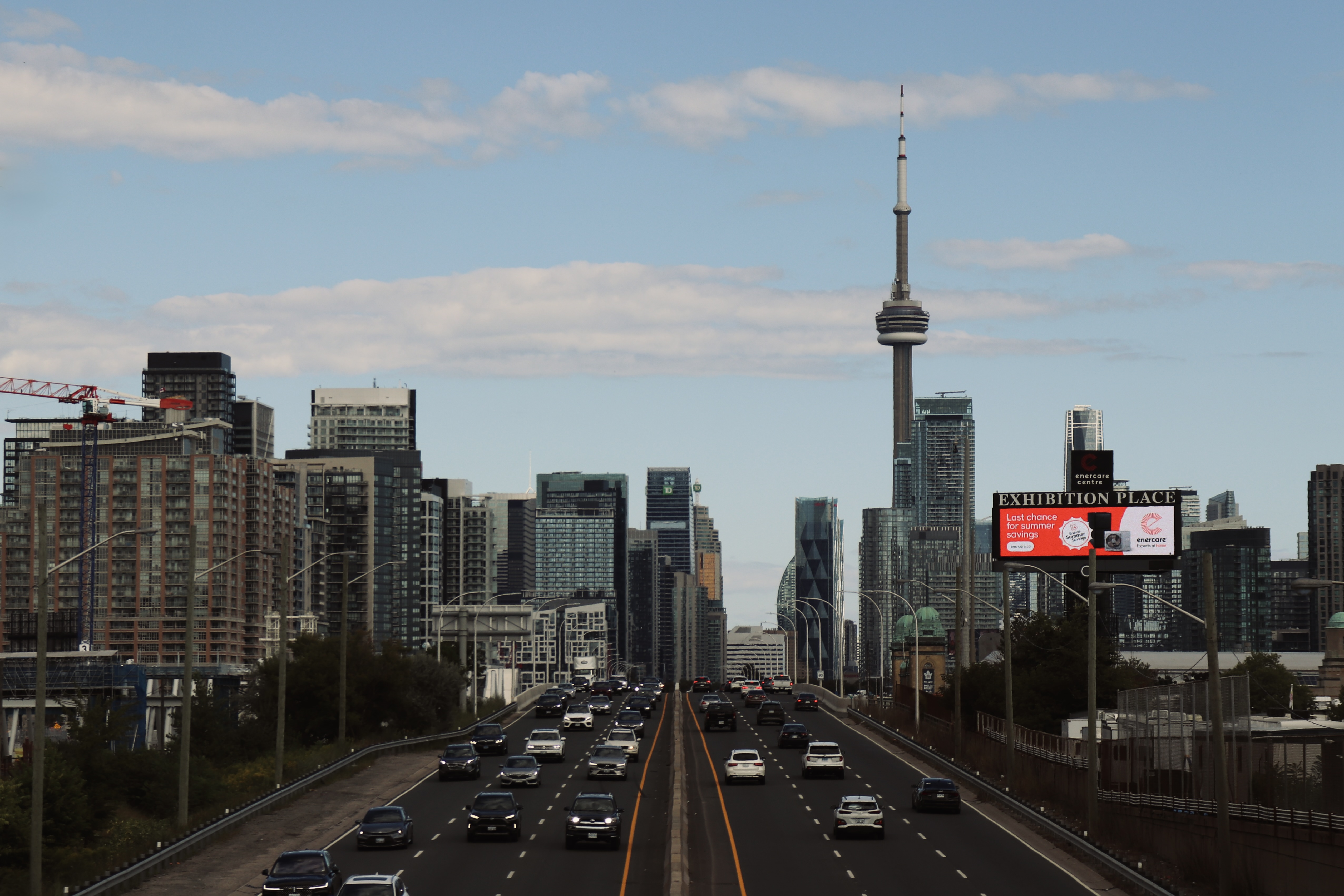 Gardiner Expressway approach toward the downtown Toronto skyline and CN Tower